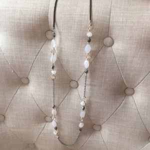 Stone and jewel long necklace with clasp, subtle silver, brown and golds